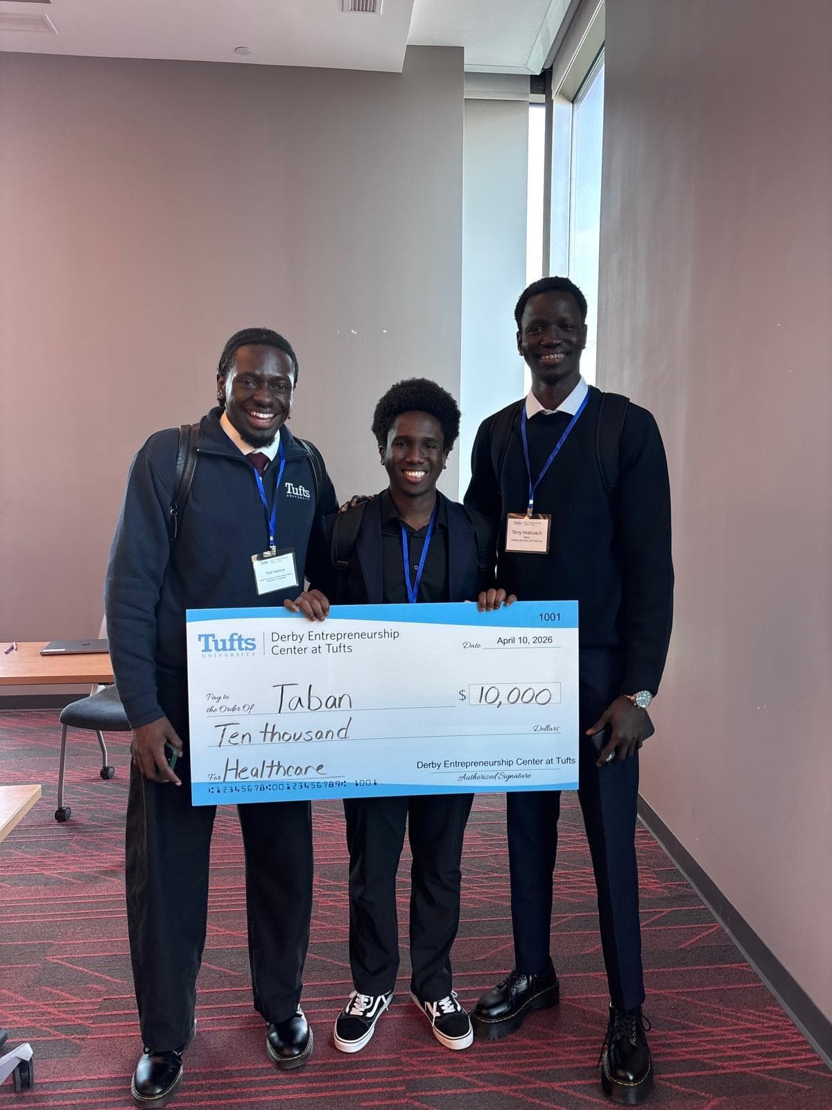 TamamHealth team winning $10,000 at Tufts New Ventures Competition 2026